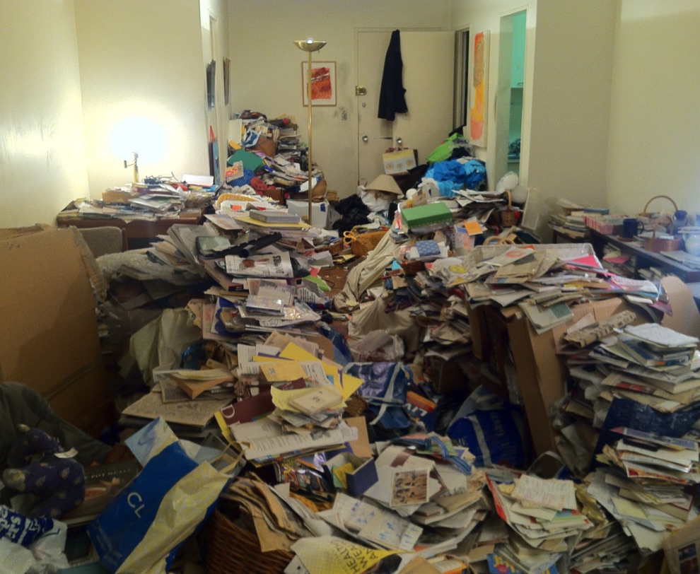 Room with papers and clutter ready for a careful cleanup plan