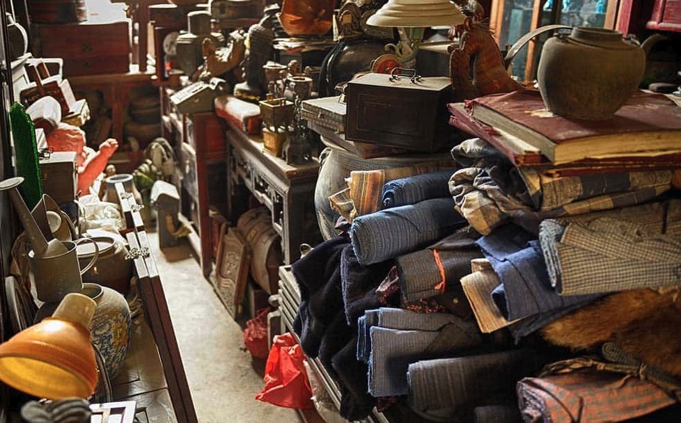 Storage area with belongings for donation and keepsake review